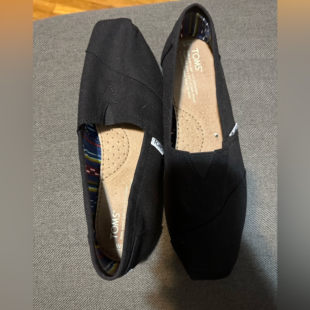 Like new black Toms for sale